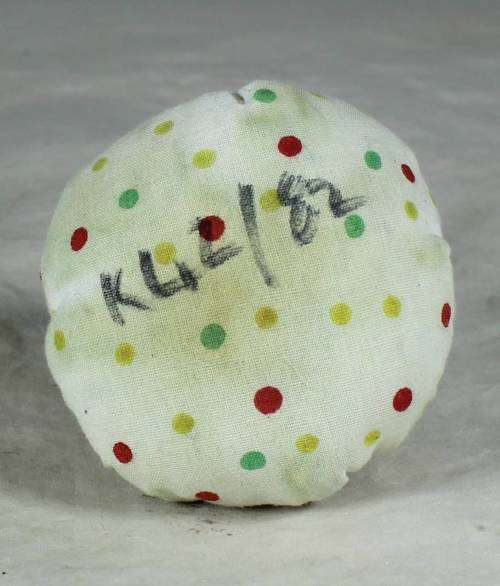 White polka dot clown on a bag