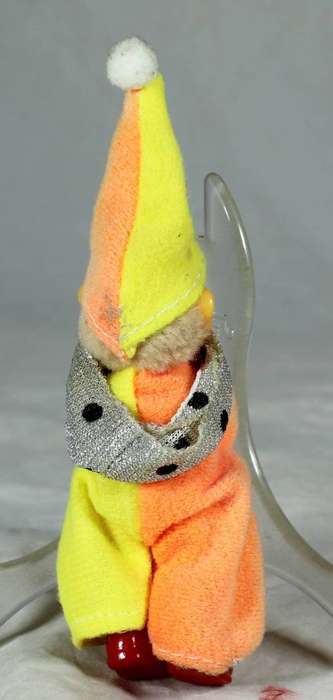 Plastic clown with red shoes