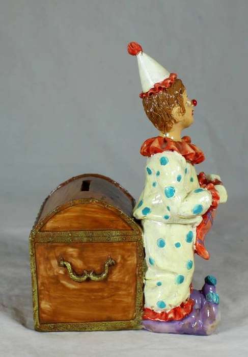 Clown with a brown treasure chest money box