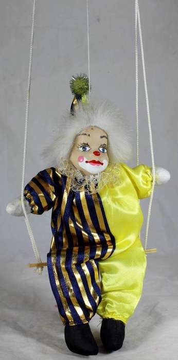 Clown sitting on a rope