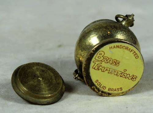 Miniature handcrafted brass temptations lidded pot