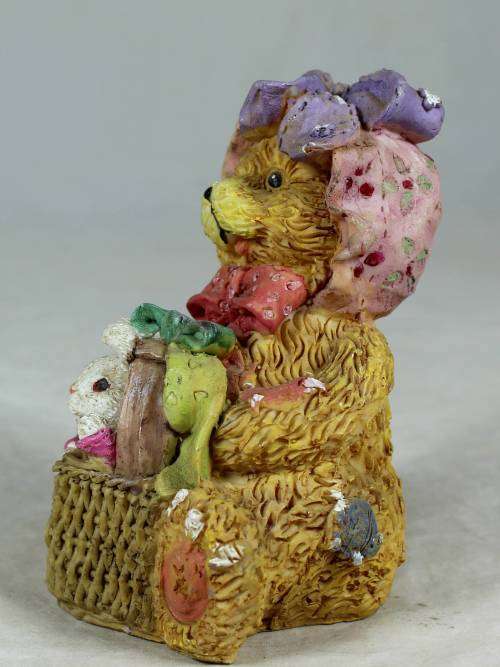 Bear with a rabbit in a basket