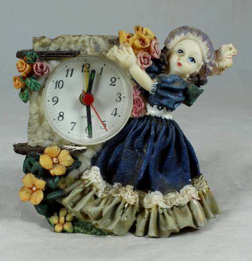 Little girl with flower clock