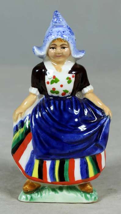 Vintage porcelain figurine - woman in traditional clothes #54