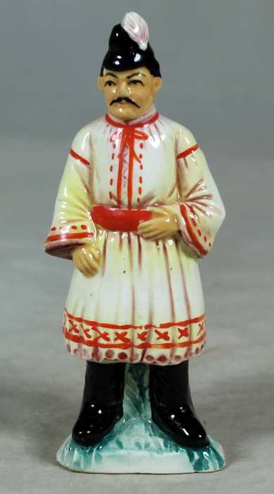 Vintage porcelain figurine - man in traditional clothes #56