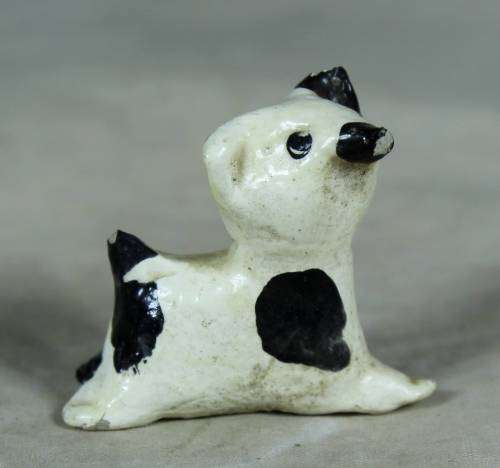 Miniature ceramic dog