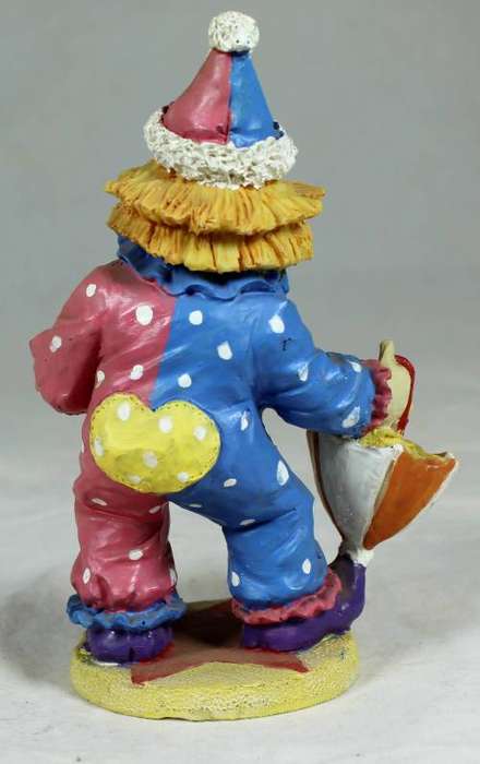 Clown with flowers and umbrella