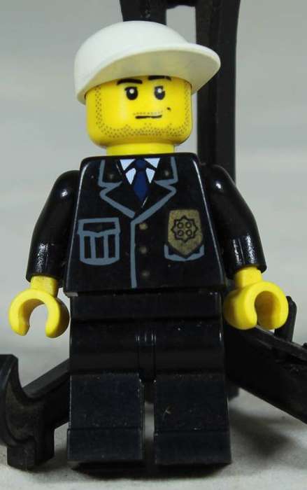Lego mini figurine - Policeman with a smile and stubble beard