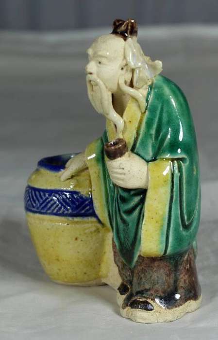 Collectible mud men - very old man with a barrel