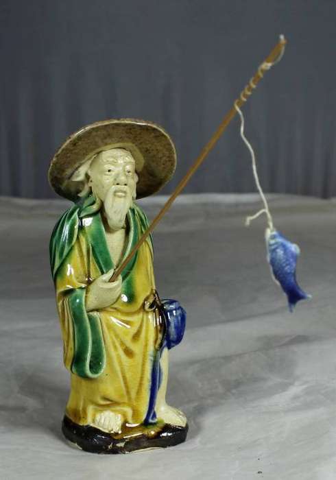 Collectible mud men - old man going fishing