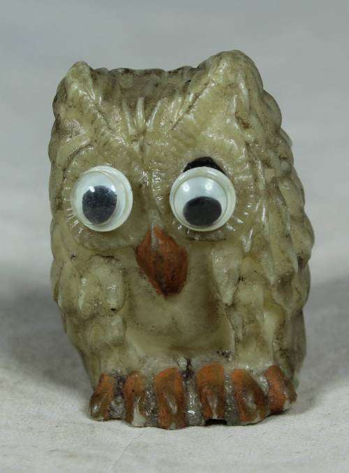 Miniature owl with moving eyes