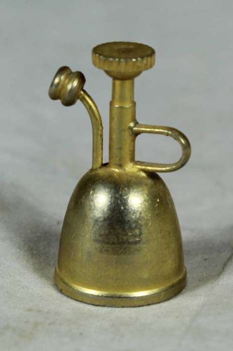 Miniature brass poison sprayer