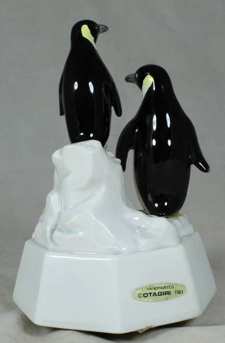 Porcelain Penguin music box