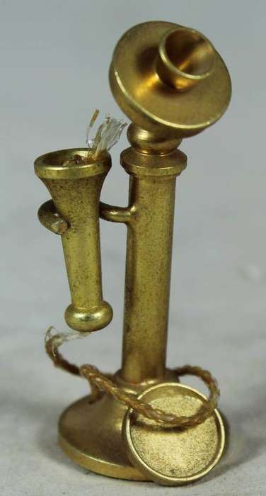 Miniature brass telephone