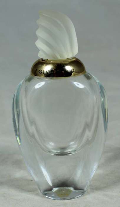 Empty Amarige Givenchy perfume bottle