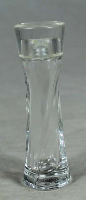 Empty pillar shaped perfume bottle