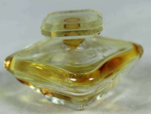 Empty miniature Lancome Tresor perfume bottle