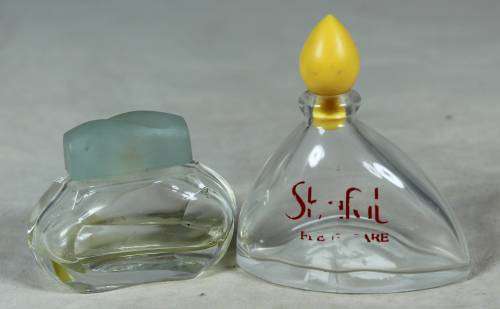 Empty pair of perfume bottles