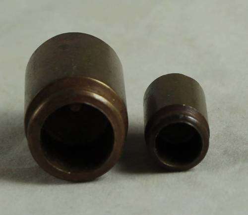 Miniature brass pair of containers