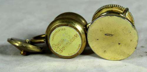 Miniature brass pot on burner