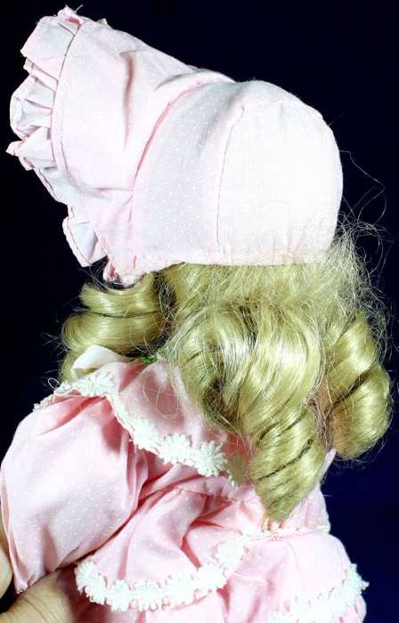 Porcelain doll - girl in pink dress