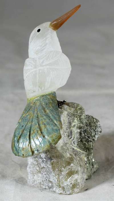 Semi precious stone - bird on rock - white bird with green feathers