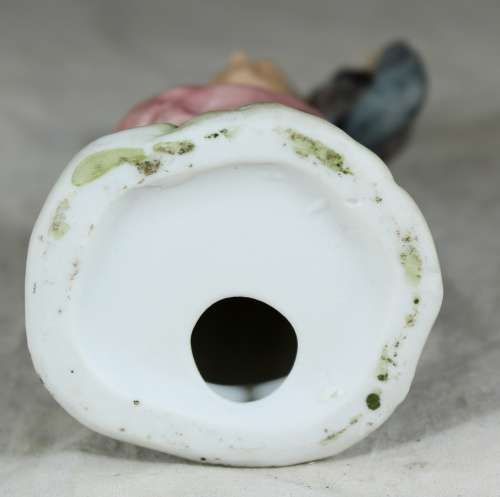 Old woman with basket figurine
