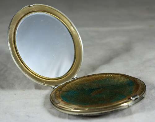 Straton powder compact with purple flowers