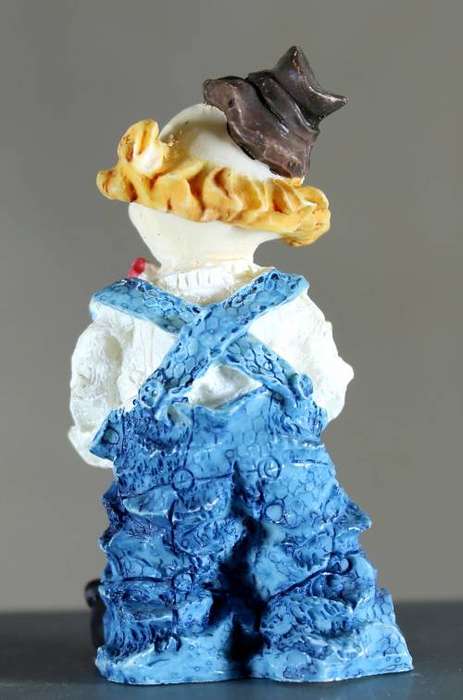 Small clown figurine with saxophone
