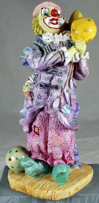 Large clown figurine - holding balls and balloons