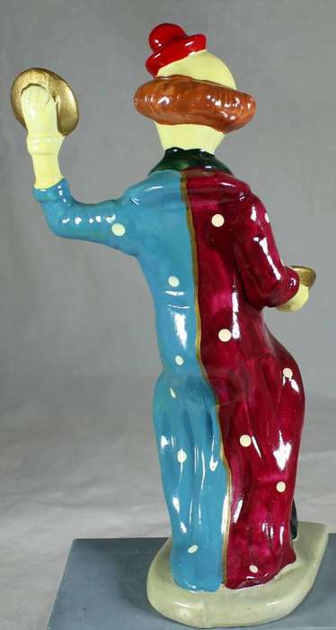Large clown figurine with cymbals