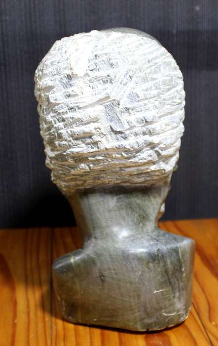 Carved stone head