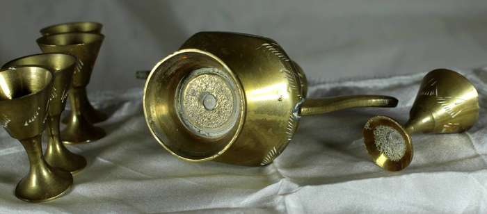 Brass Turkish style tea pot with six cups