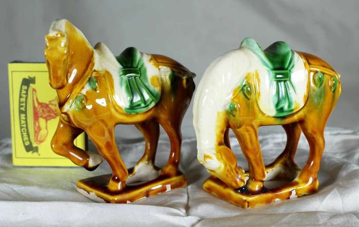 Pair of Chinese style horses with satchel