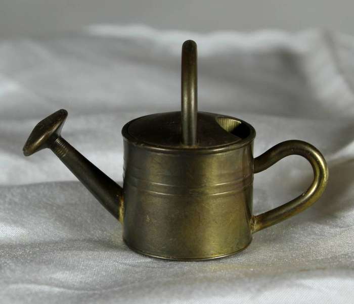 Miniature brass watering can