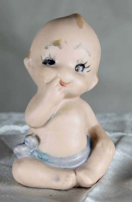 Vintage porcelain Kewpie doll - Piano baby sucking thumb