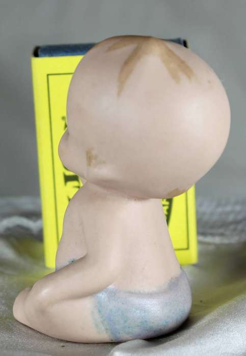 Vintage porcelain Kewpie doll - Piano baby sucking thumb