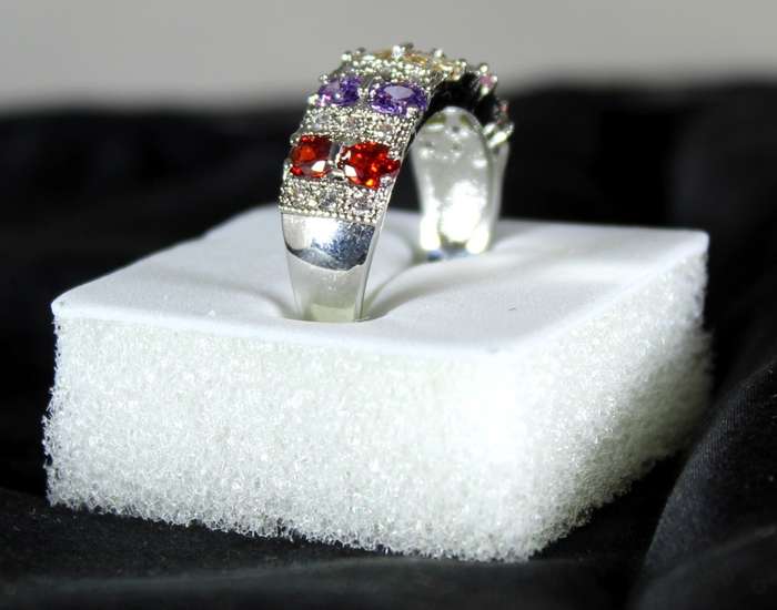 Costume jewellery - five coloured emerald look ring