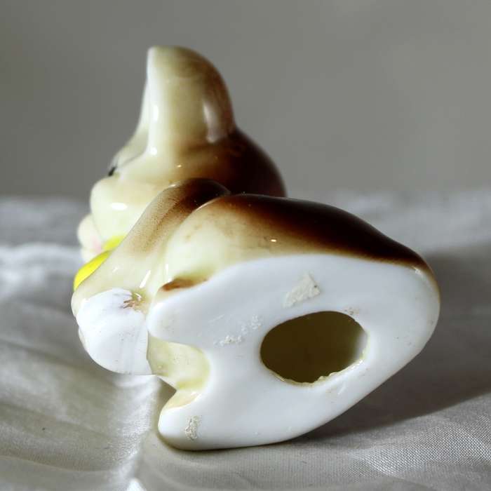 Vintage porcelain mouse with bottle