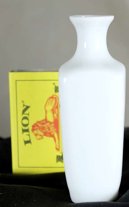Small Chinese glass bud vase