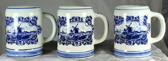 Set of three Delft hand-painted small mugs