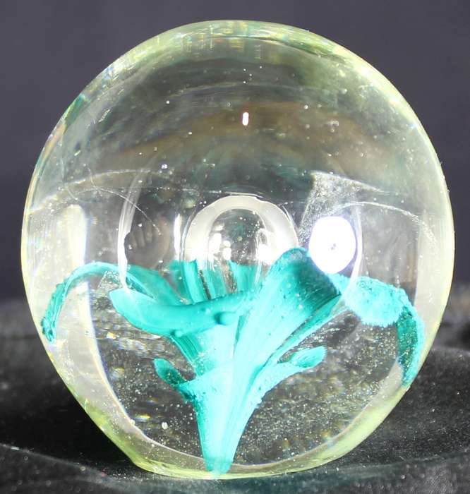 Glass paperweight with flower