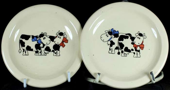 Pair of cow themed trinket dishes
