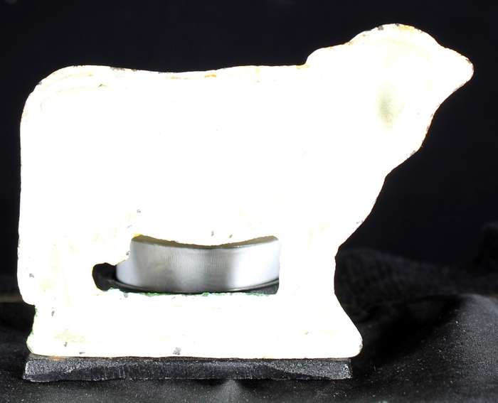 Vintage cast iron cow candle holder