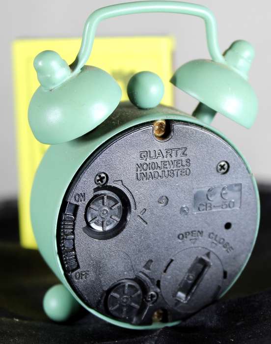 Miniature working green alarm clock