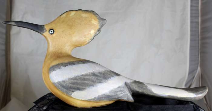 Signed African art - wooden woodpecker