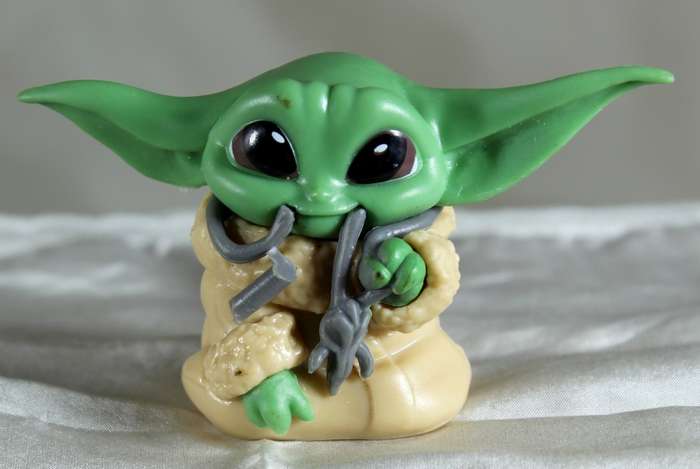 The Mandalorian - Grogu Holding Something