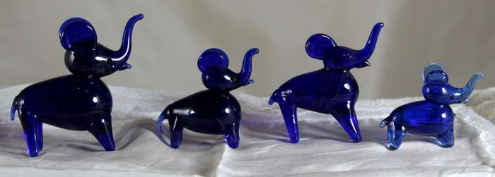 Cobalt blue vintage elephants with trunks up - set of four