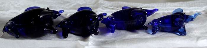 Cobalt blue vintage elephants with trunks up - set of four