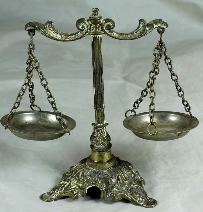 Ornate brass balance scale